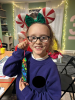 Child with Christmas bookmark