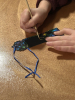 Child making Christmas bookmark